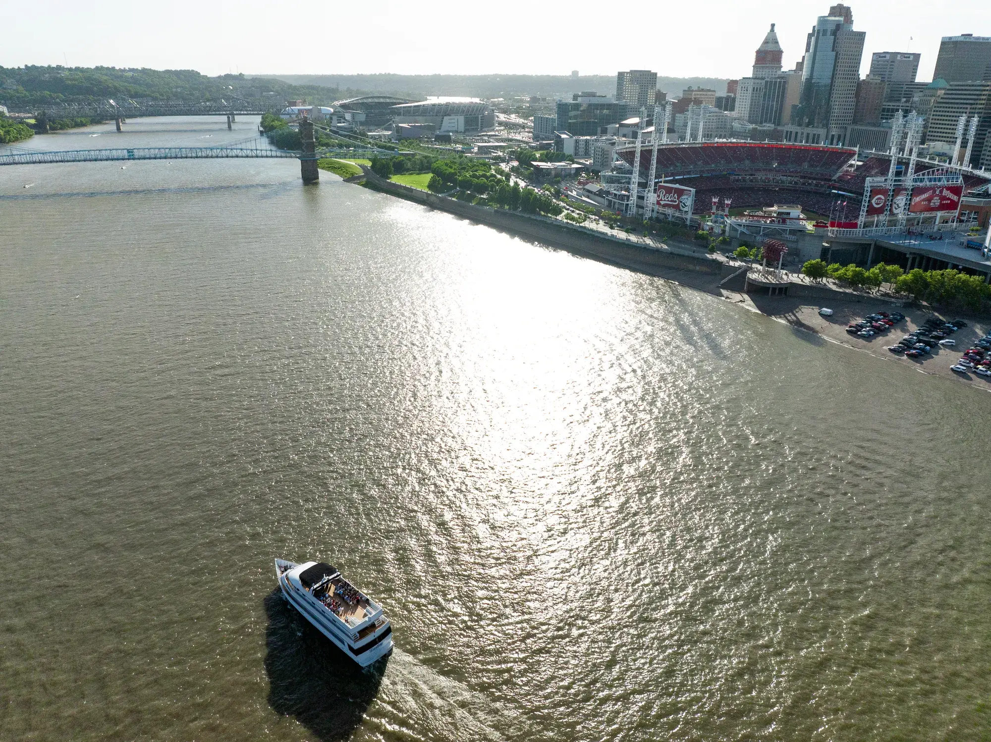 Aerial view of a wedding cruise aboard The Destiny with the Cincinnati skyline and riverfront