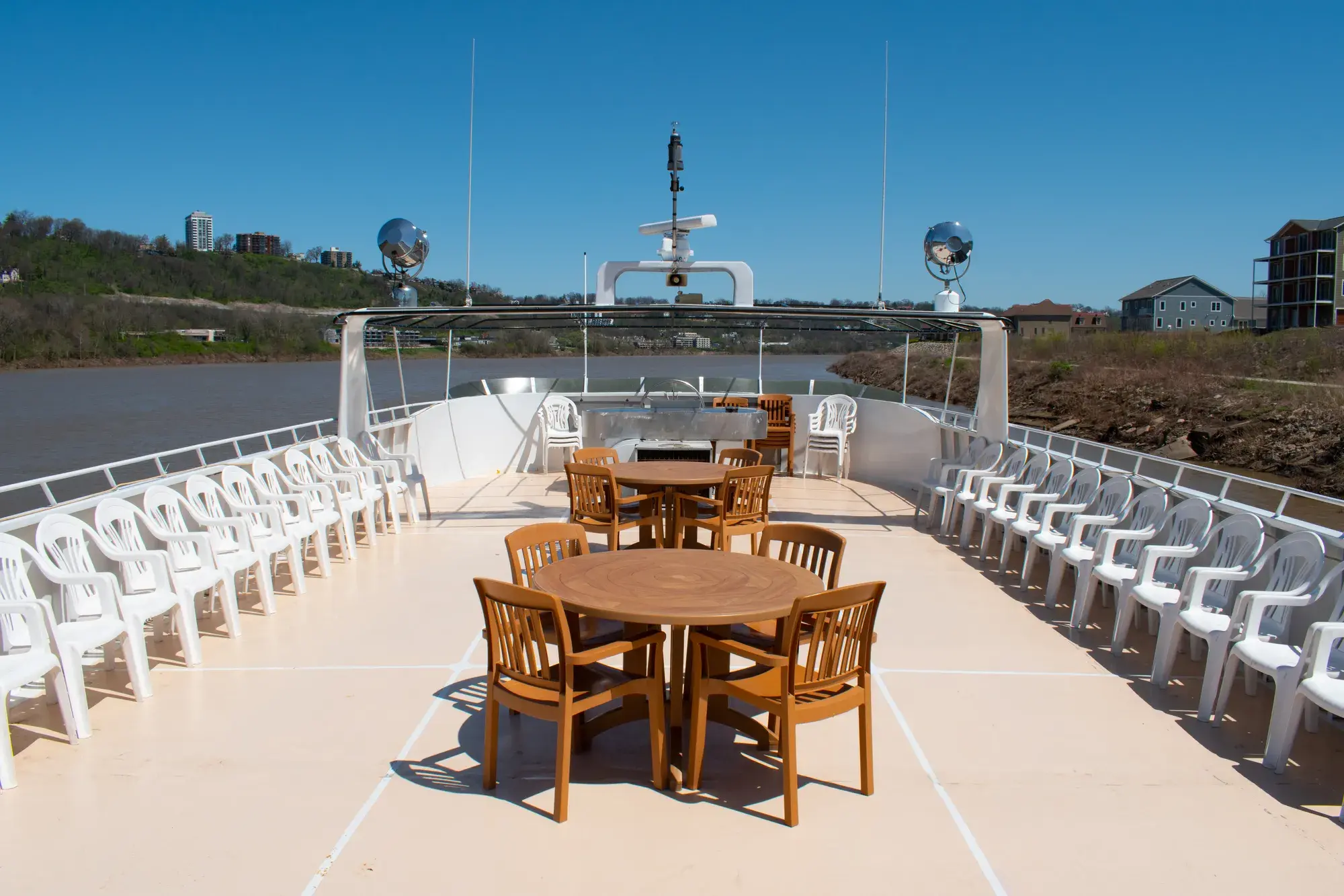 Tables set on the deck of The Destiny before guests board